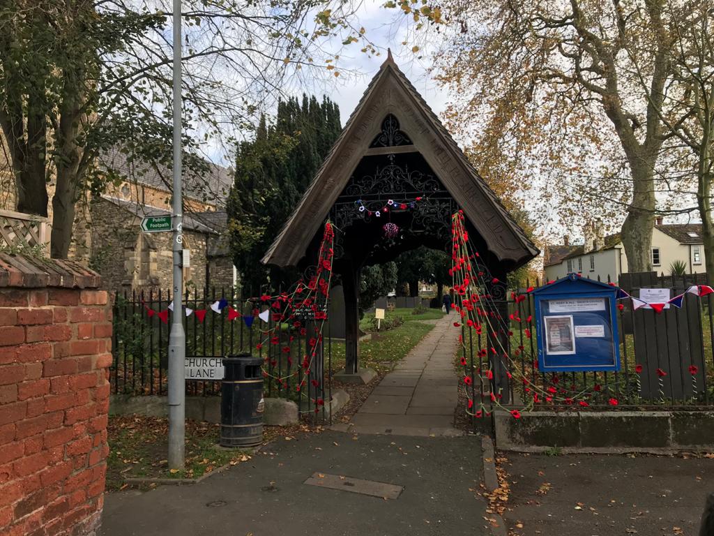 You are currently viewing Remembrance – Poppies on the Church Railings